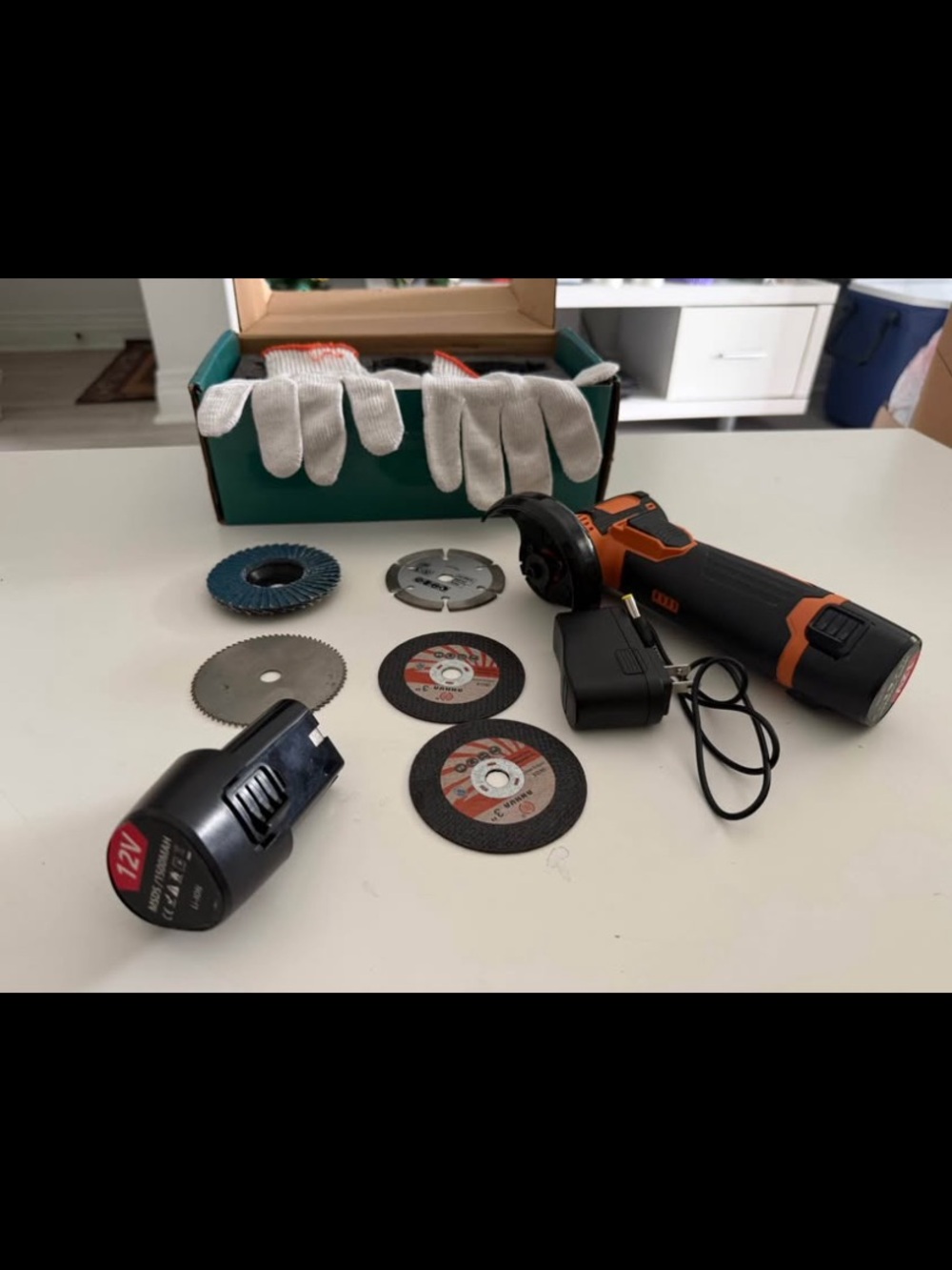 12V Cordless Angle Grinder Kit in Black and Orange